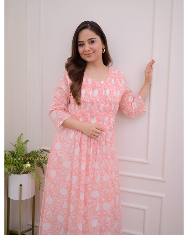 Peach Floral A Line Mul Cotton Kurti