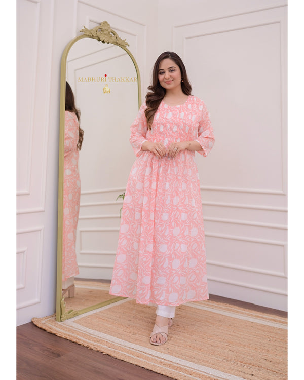 Peach Floral A Line Mul Cotton Kurti